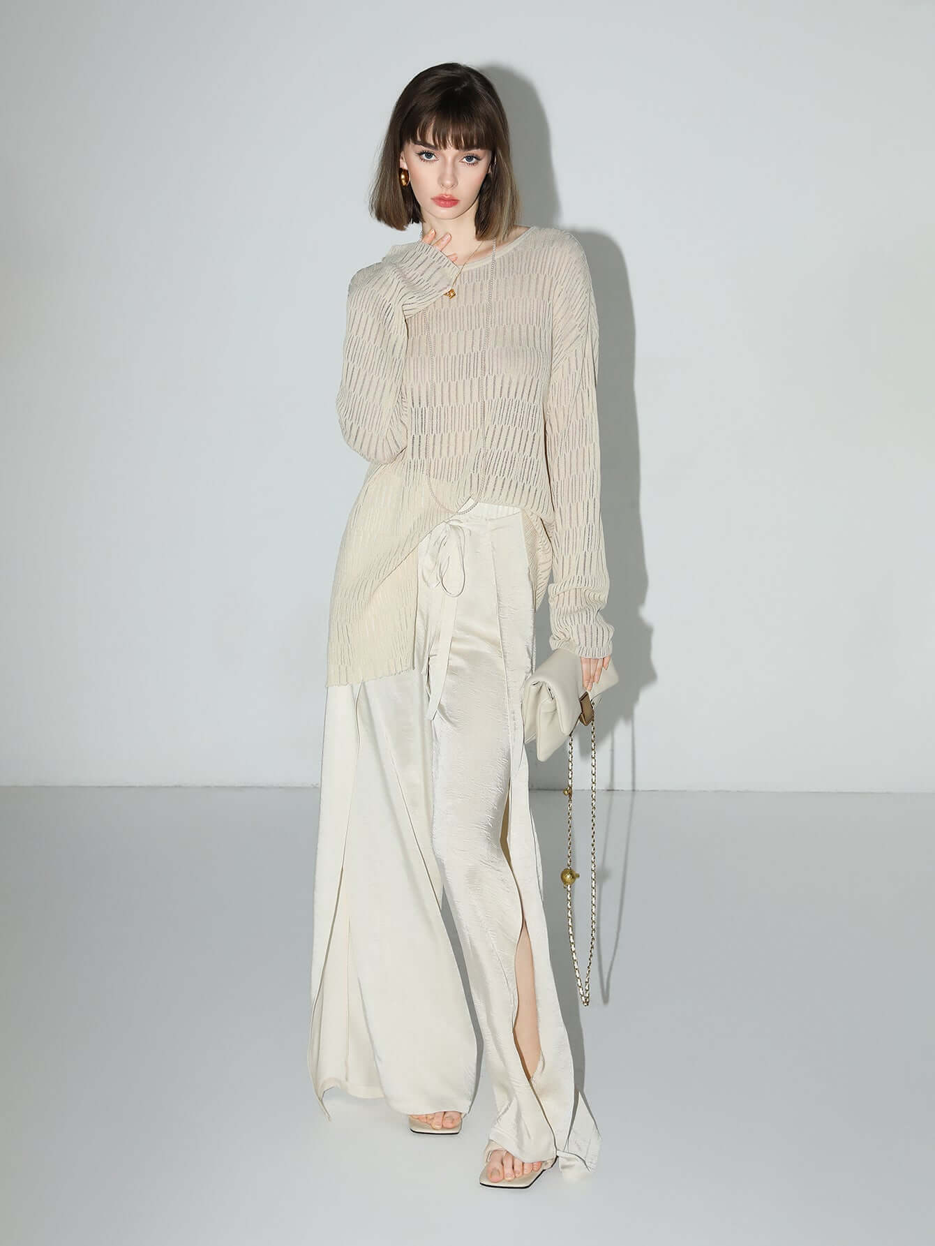 Sheer Knit Top with Asymmetrical Hem-4